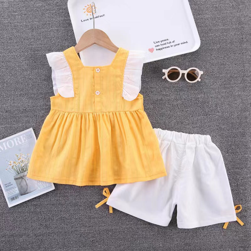 Ruffle dress with white shorts