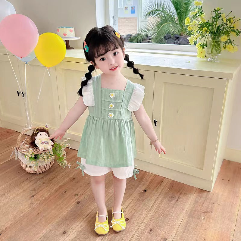 Ruffle dress with white shorts