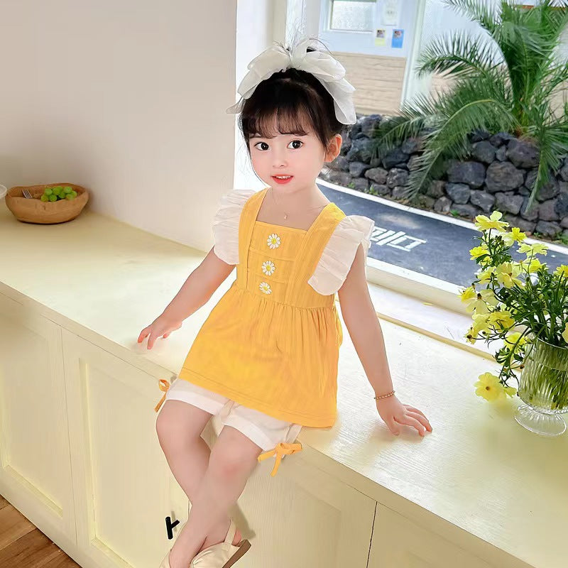 Ruffle dress with white shorts
