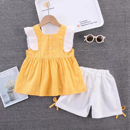Ruffle dress with white shorts