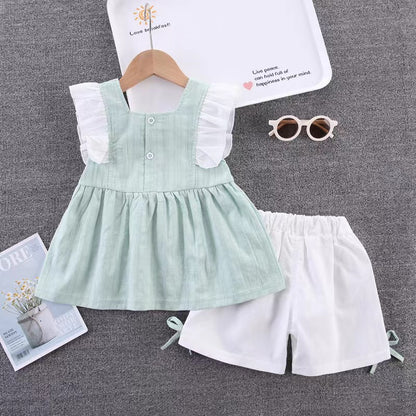 Ruffle dress with white shorts
