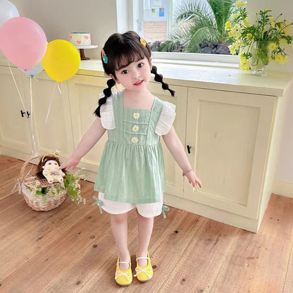 Ruffle dress with white shorts